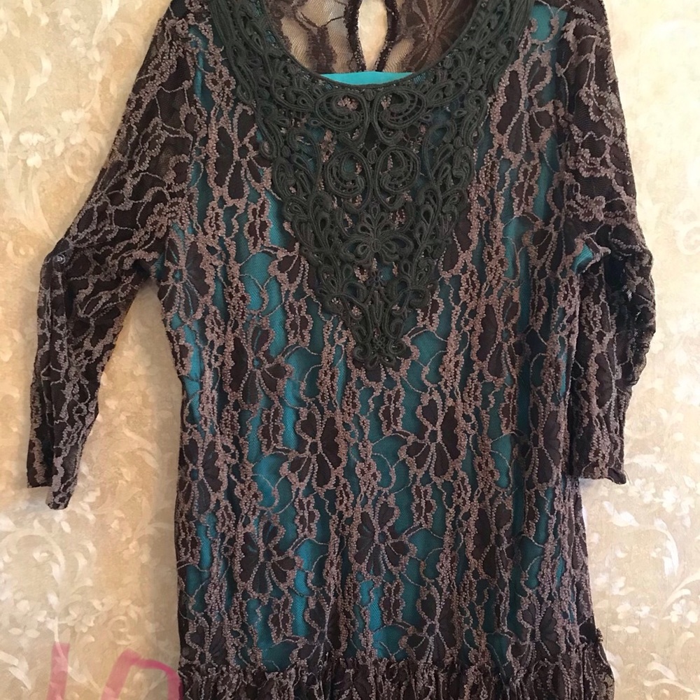 Lace overlay with sheer ruffle bottom